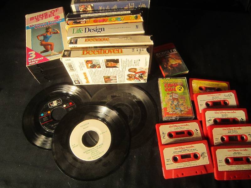 lot 613 image: VHS Movies, 3 - 45 Record & Walt Disney Cassettes