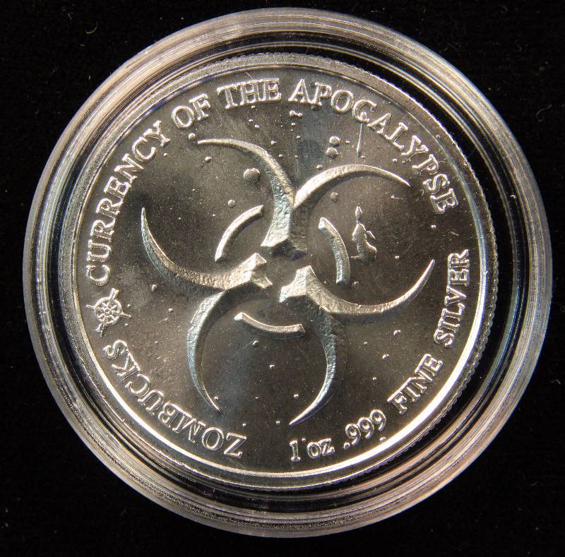 1 TROY OZ. .999 FINE SILVER ZOMBUCKS THE SAINT APOCALYPSE ROUND IN AIRTITE HOLDER