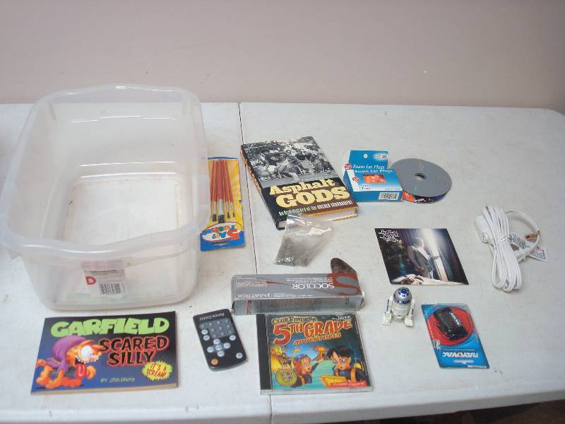 Bin With Mixed Items, Garfield Book, Ear Plug...