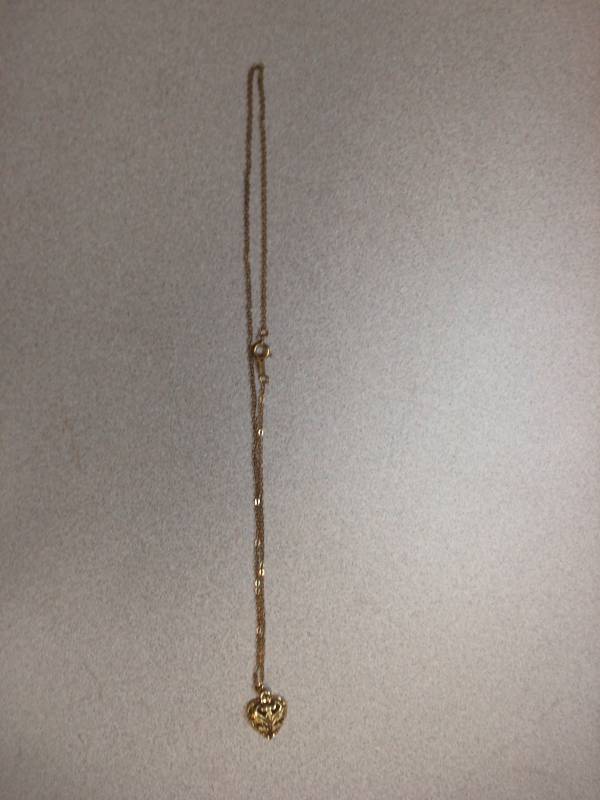 Gold Tone Heart Necklace...