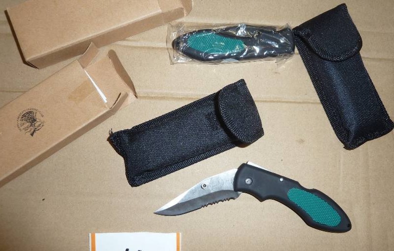 Two green lockback pocket knives - ...