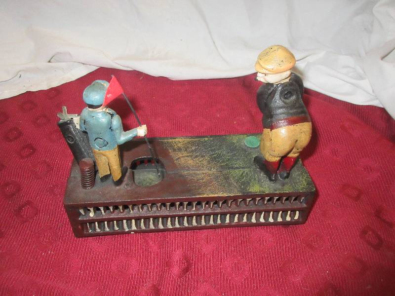 VINTAGE CAST IRON GOLFER BANK