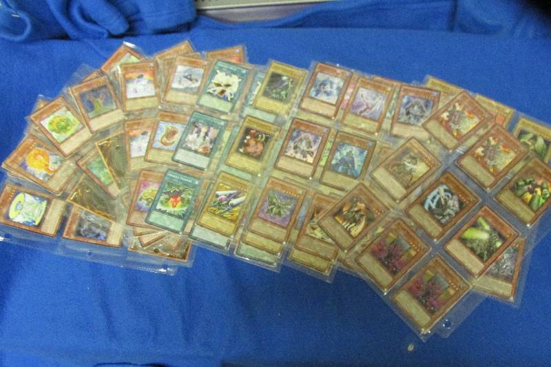 Album pages of Yu Gi Oh cards