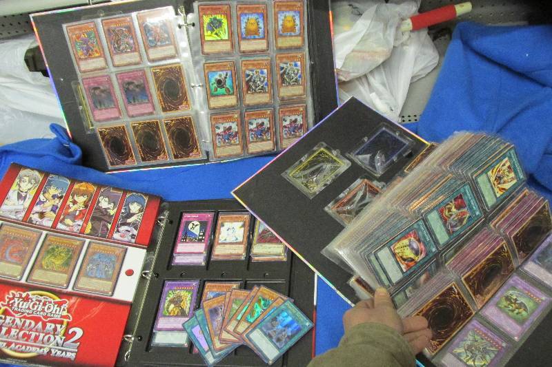Album pages of Yu Gi Oh cards