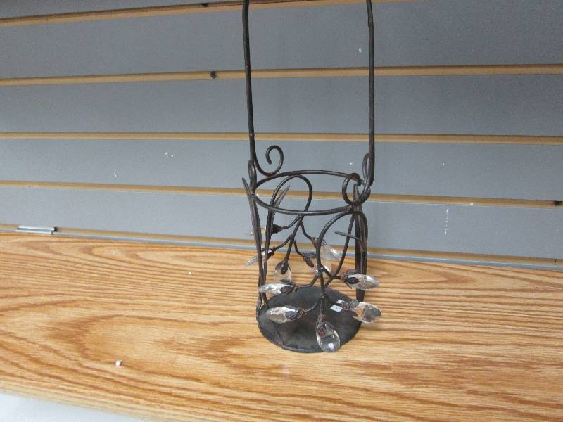 Decorative dark metal pillar candle...