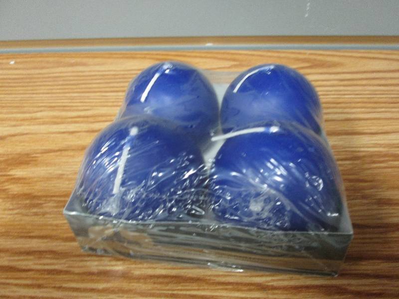 Set of Four 2 38 inch ball candles...