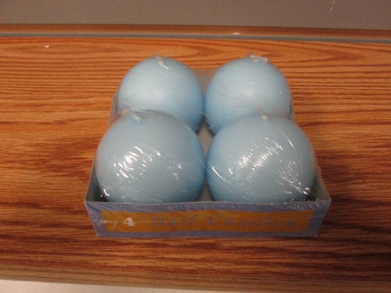Set of Four 2 38 inch ball candles...