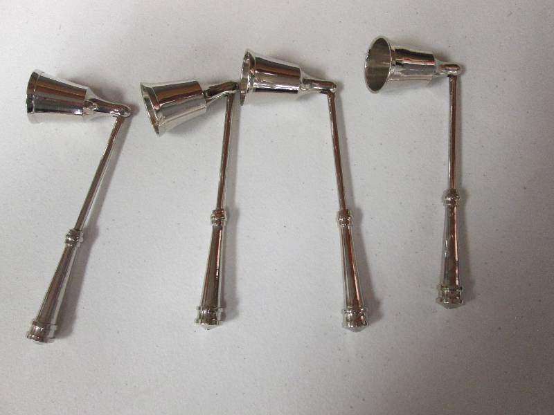 Lot of 4 metal candle snuffers...