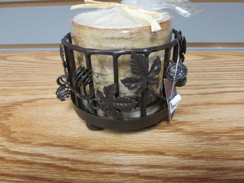 Brown metallic holder with birch ca...