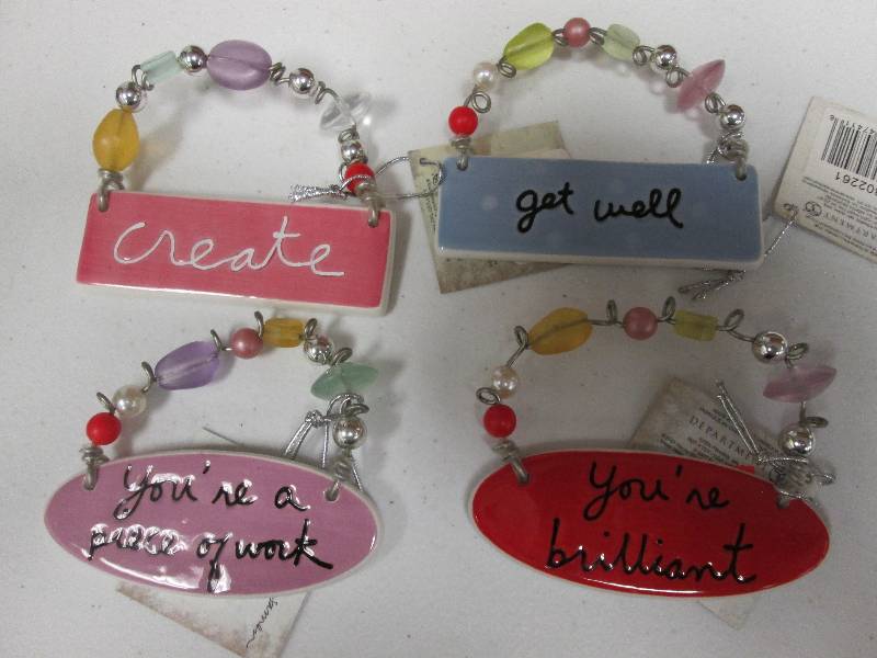 Lot of 4 assorted charm tiles...