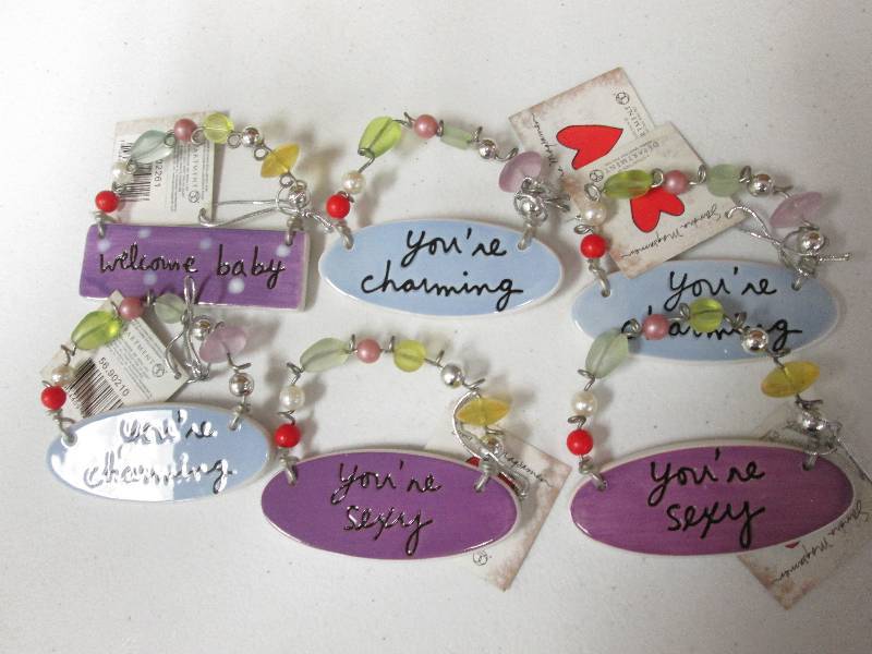 Lot of 6 assorted charm tiles...