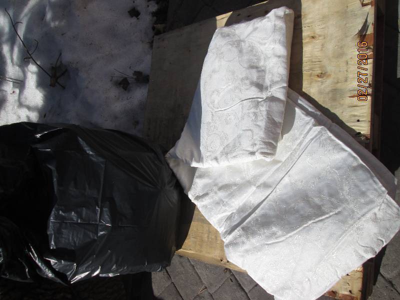 Large bag filled with blanket linen...