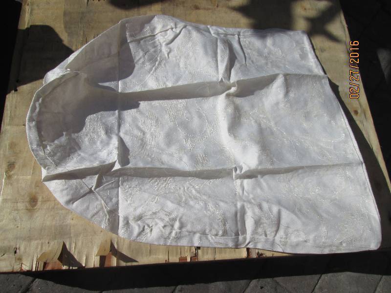 Bag of half oval shaped linen pillo...