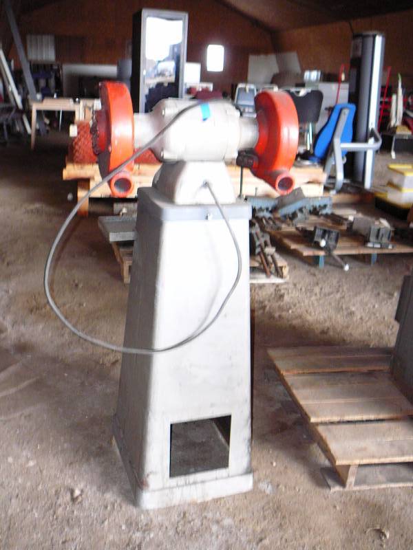 lot 143 image: 8 Grinder & Stand Sioux works