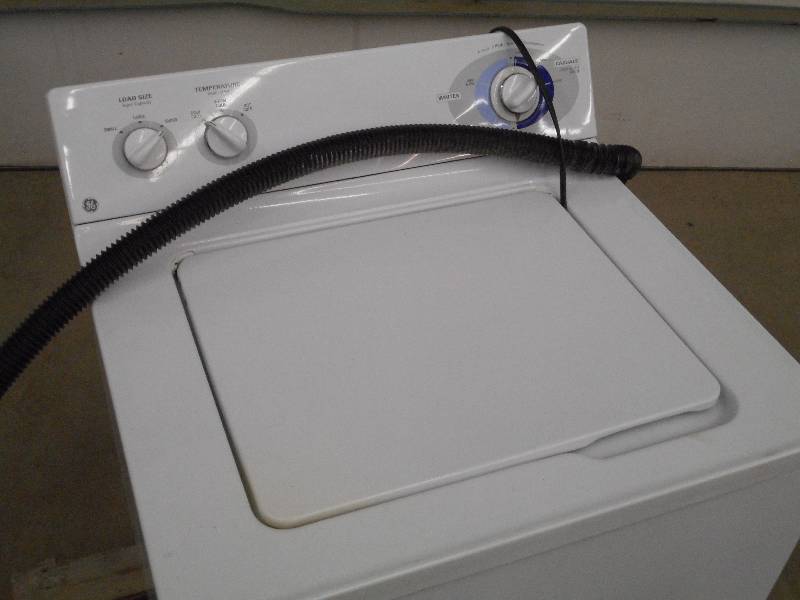 lot 4 image: GE Super-Capacity 8-Cycle Wash Mach...