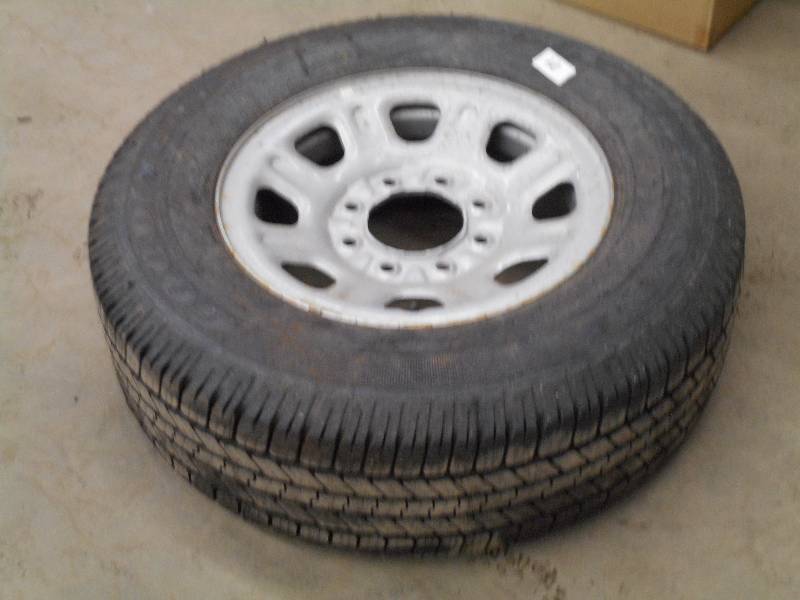 lot 28 image: Like New Goodyear Wrangler SRA LT26...
