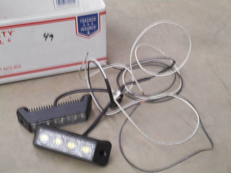 lot 49 image: (1) Unused 4-Bulb 12Volt LED Light ...