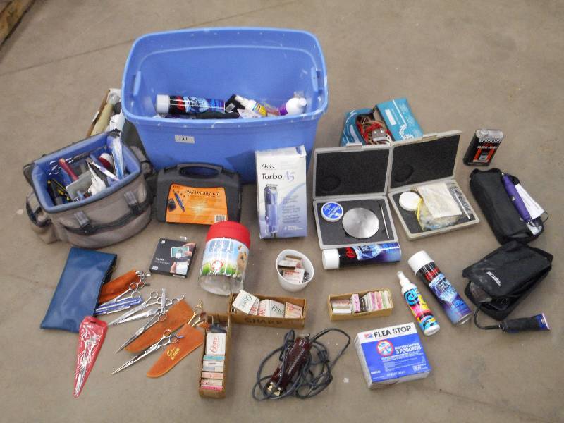 lot 121 image: Tote Of Assorted Dog Grooming Prod...