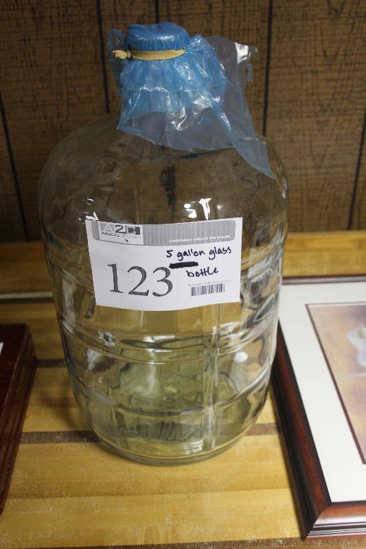 lot 123 image: 5 Gallon Glass Bottle