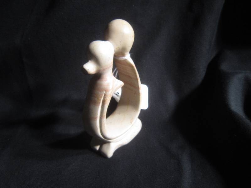 Couple Kissing Sculpture