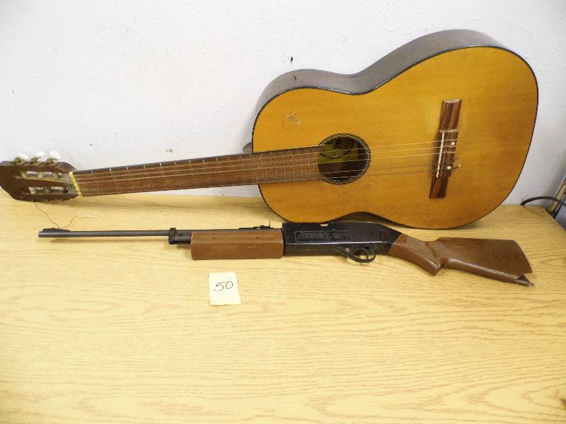lot 50 image: Guitar w BB Gun