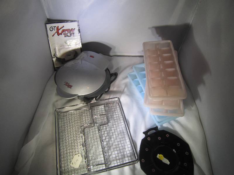 lot 853 image: Lot of Kitchen Items - Ice cube trays, Silverware Holder, GT Express 101, Antique Black Glass Plate