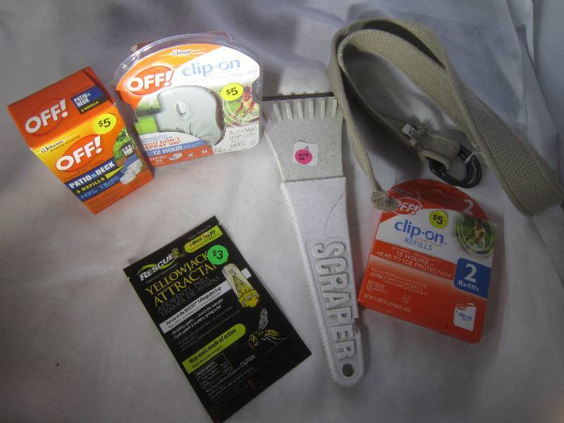 lot 939 image: LOT - Bucket, Brand New Mosquito Clip on, Patio and Deck Refill, Yellow Jacket Attraction, Belt, ETC