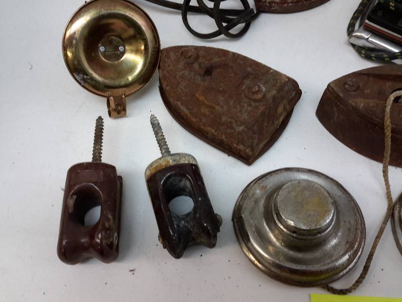 lot 28 image: Misc. Industrial salvage items Irons, Shoe Iron, Electric insulators, Kerosene lamp pieces