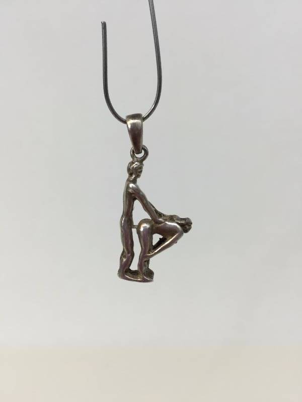 lot 80 image: Erotic Sterling Pendant wt. 4.0g