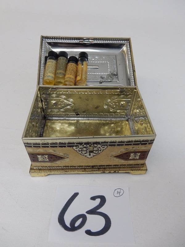 lot 63 image: Metal Box w 4 Vials of  Prayer Oil