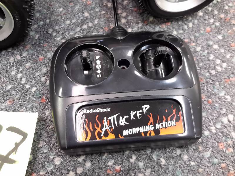 lot 137 image: Radio Shack Remote Control ATTACKER.. Morphing Car.. Untested but looks NEW