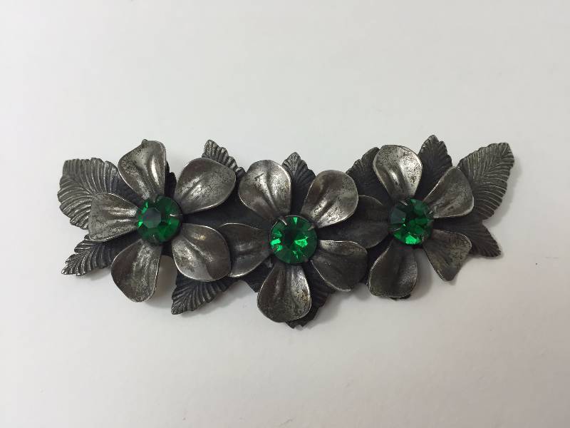 lot 82 image: Floral Pin (1928 Jewelry) & Jeweled Clip Marked  missing the F.