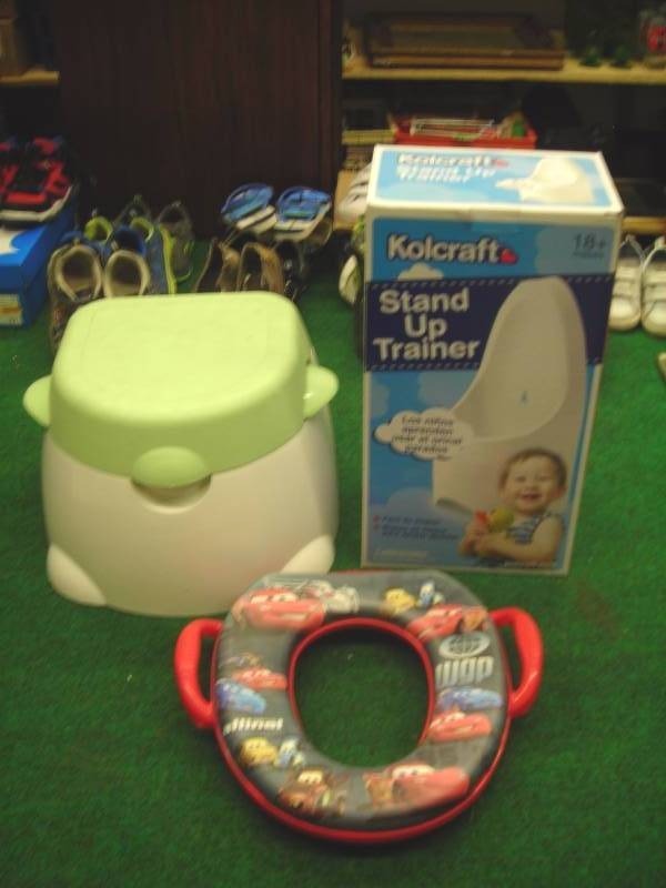 lot 29 image: Potty ChairStep Stool, Stand-Up Urinal Trainer, Training Ring