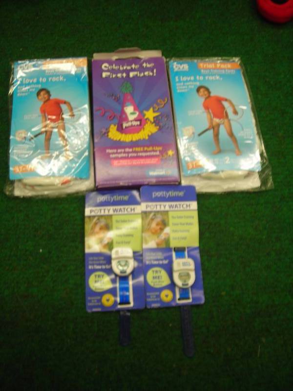 lot 30 image: Potty Training Related 2-Potty Time Musical Watches, Pull-Ups