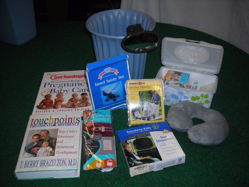 lot 50 image: Lot Of Stroller Netting, Mirror For Car, Cabinet Locks, Outlet Covers, Books, Related