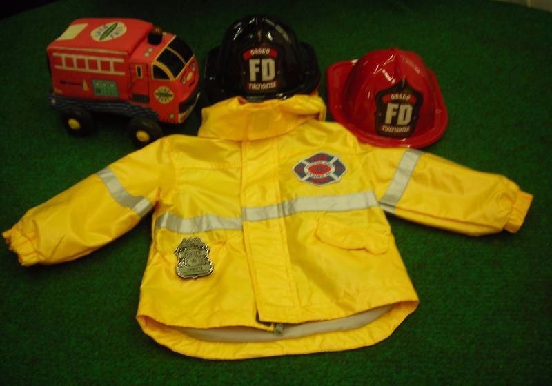 lot 63 image: Fireman Rain Jacket (24 months), Helmets & Fire Truck Toy