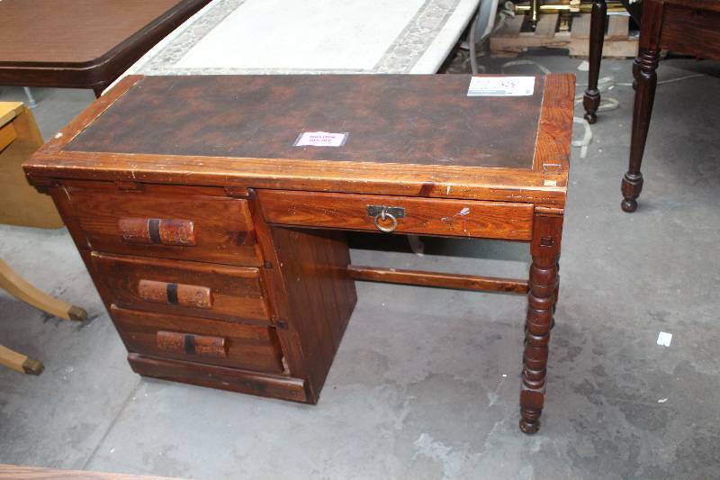 lot 35 image: Rawhide 4-Drawer Wood Desk