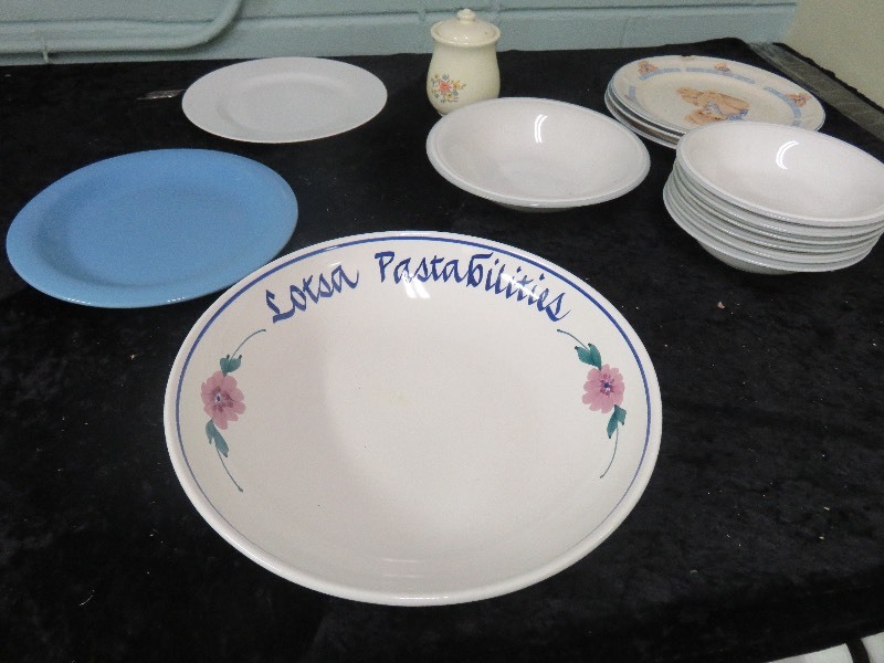 lot of mismatched dishes