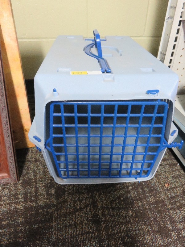 Dog crate on wheels