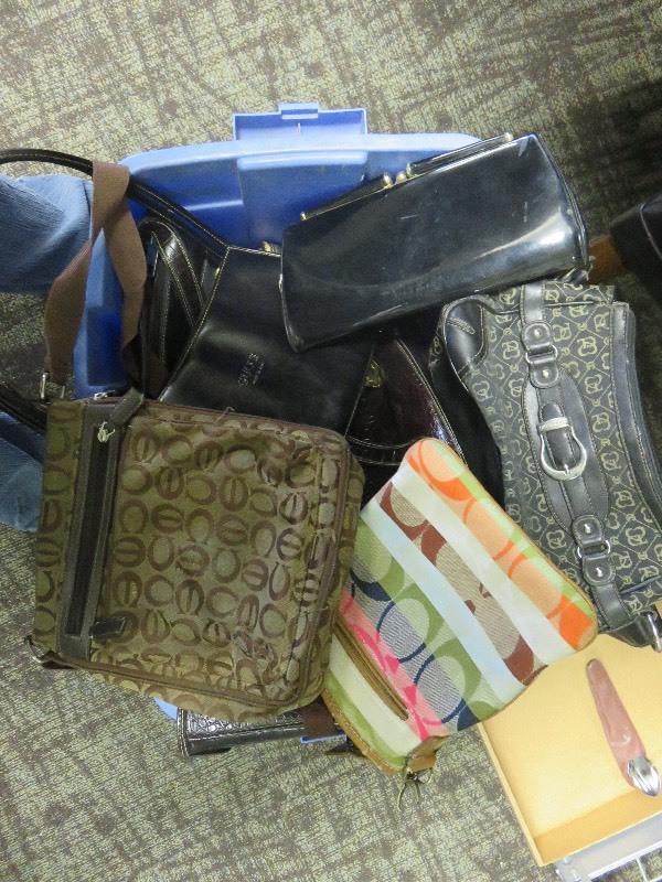 Large bin of purses  (Coach, Gucci)