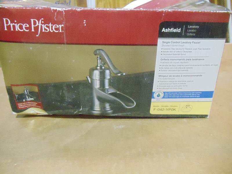 lot 55 image: NEW Price Pfister Ashfield Lav Faucet Waterfall Style F-042-YP0K