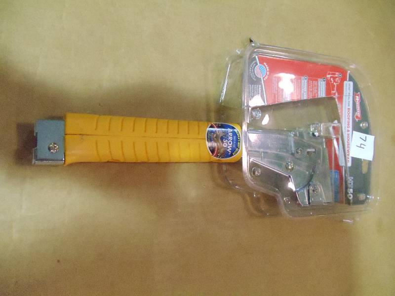 lot 74 image: NEW Arrow HT50 Hammer Tacker for Roofing and House Wrap. Open Retail Package