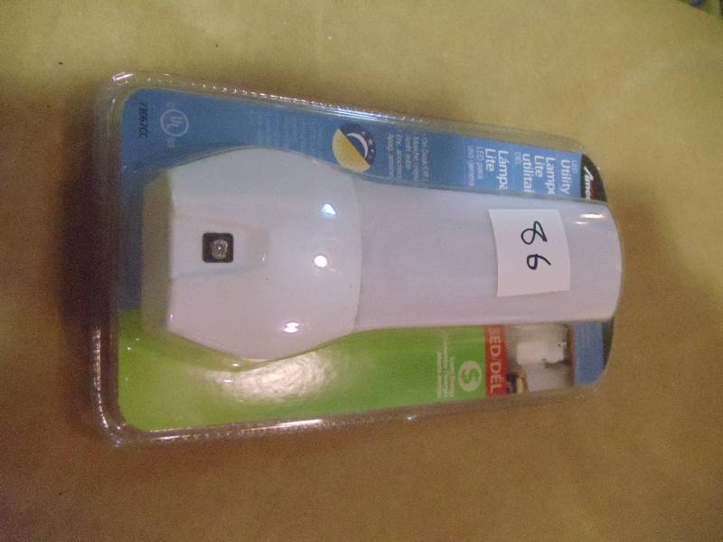 lot 86 image: NEW LED Utility Light with On Off Dusk to Dawn Control