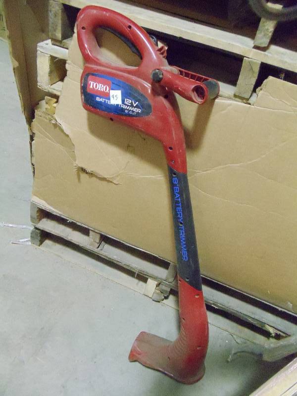 lot 95 image: USED Toro 12 Volt 8 In Battery Trimmer with Charger Not Tested