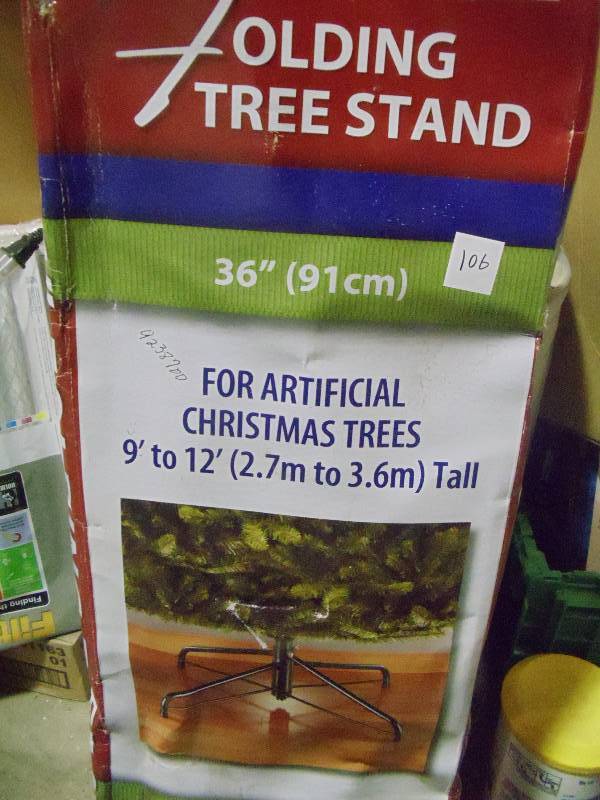 lot 106 image: NEW 36 in Artificial Tree Stand