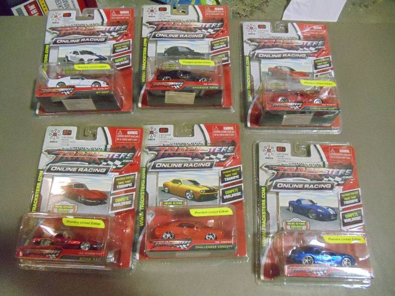 lot 189 image: NEW Qty 6 Tracksters Die Cast 164 Scale Toy Cars with Access Code for Online MMOG Gaming