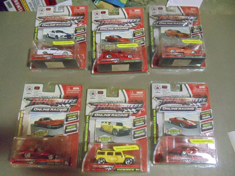 lot 193 image: NEW Qty 6 Tracksters Die Cast 164 Scale Toy Cars with Access Code for Online MMOG Gaming