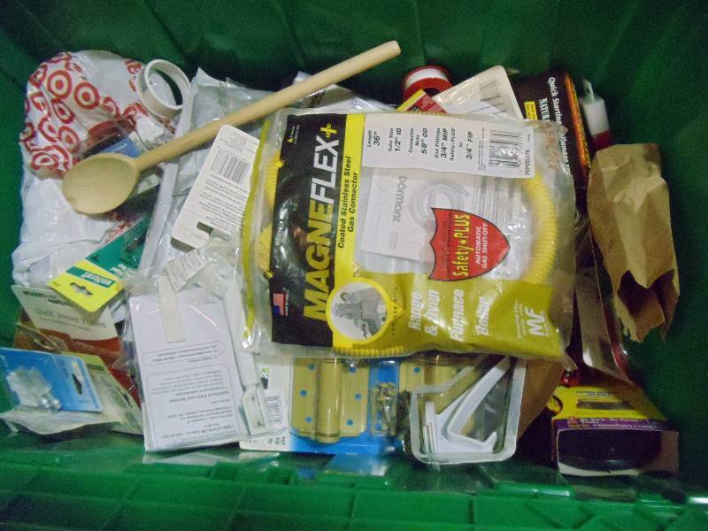 lot 218 image: NEW Entire Bin Misc Hardware Items incl. Flex Gas Hose, Hinges, Hasps, Fire Starters and MORE. GREEN BIN NOT INCLUDED