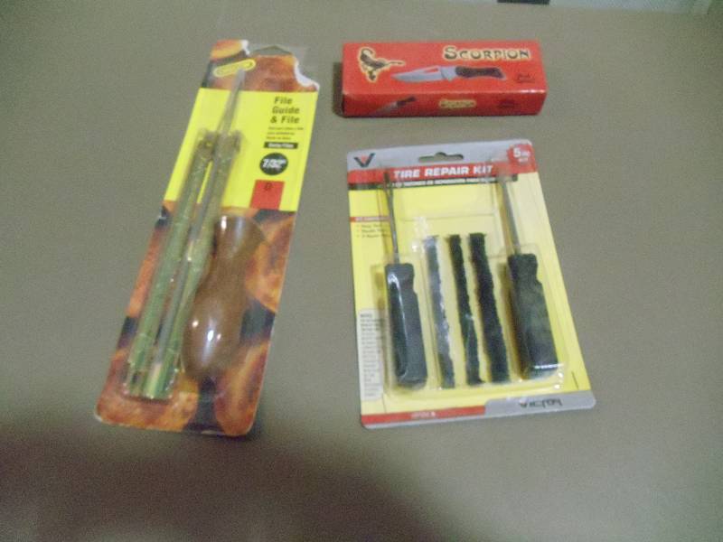 lot 221 image: NEW Lot incl. File with Guide, Tire Repair Kit, Pocket Knife