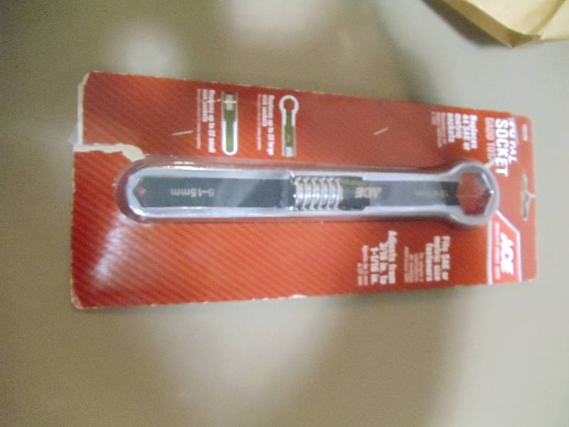lot 226 image: NEW Total Socket Wrench, 5-27mm Replaces 44 SAE or Metric Sizes